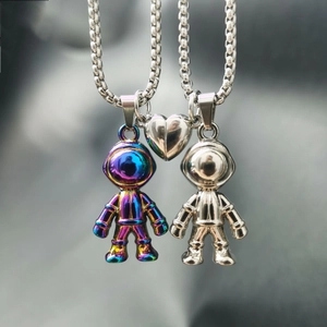 Colorful astronaut couple necklaces with magnetic heart pendant on box chain