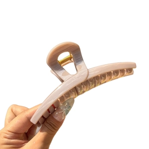 Matte peach butterfly hair claw clip 13.5cm for thick hair shown on a white background