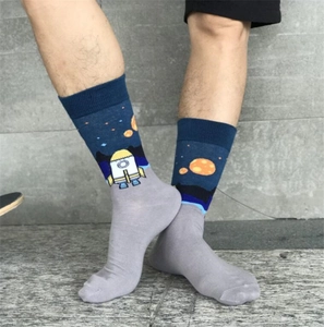 Men's cotton mid-calf socks featuring deep blue space patterns with rockets and planets