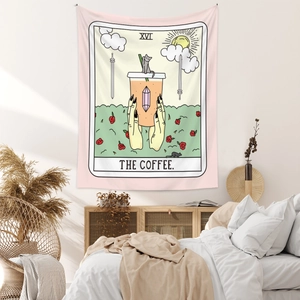 Close-up of pink Tarot style tapestry featuring The Coffee design on a white interior wall