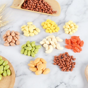 Realistic PVC fake grains and dried fruit props including peanuts and corn on marble
