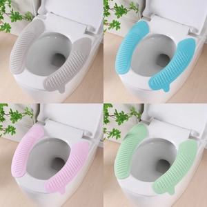 Detail view of waterproof EVA toilet seat covers in grey, blue, pink and green options