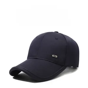 Detail view of navy blue cotton baseball cap with a small silver metal side buckle