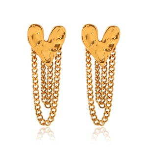 Gold heart-shaped earrings with hammered texture and layered chain tassels on white background