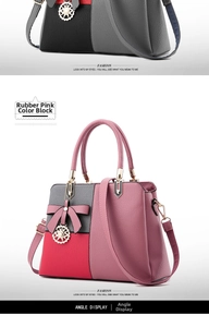 Detail view of pink and grey patchwork tote with bow and metallic circular pendant