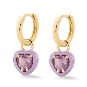 Macro view of gold hoop earrings featuring purple enamel and faceted heart-shaped gemstones