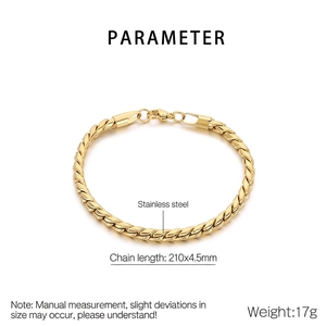 Macro detail of 210mm gold plated stainless steel curb chain bracelet with glossy finish
