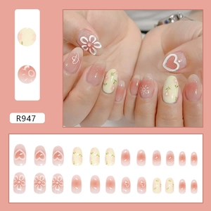 24-piece press-on nail set with sweet floral star patterns and cream pink gradient nails