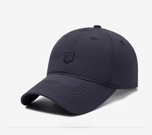 Close-up of a breathable mesh baseball cap with shield logo and stitched brim detail