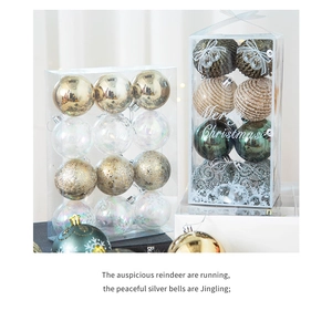 Detail view of assorted Christmas ball ornaments in gold, green, and silver glitter finishes