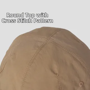 Close-up of circular cap top with cross texture on lightweight quick-dry sun hat