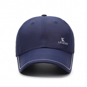 Navy quick-dry baseball cap with K LEGEND embroidery and reflective brim detail