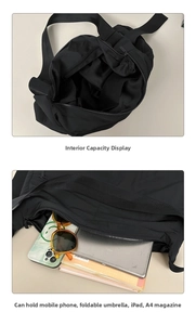 Detail of black nylon tote bag showing spacious interior with iPad and daily essentials