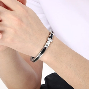 Minimalist silver and black stainless steel rivet bangle for men and women