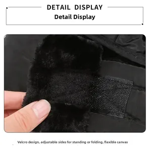 Dettaglio del cappello da aviatore nero con cinghie velcro e fodera in ecopelliccia