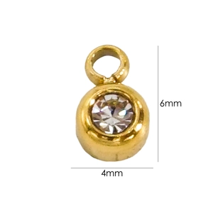 Macro detail of 6x4mm 14K gold plated pendant with sparkling faceted rhinestone inlay