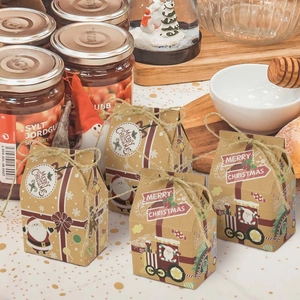 Brown kraft paper Christmas house gift boxes with Santa patterns and twine ties