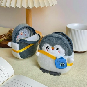 Cute gray plush penguin coin purse with blue camera decor and crossbody strap