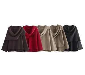Detail showing five colors of asymmetric knit poncho sweaters in coffee, red, beige, camel and black