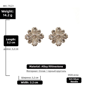 Detail of silver flower earrings with rhinestones showing dimensions 3.2cm and 14.2g weight