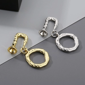 Baroque OT toggle clasps in gold and silver finish with irregular hammered texture