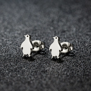 Minimalist stainless steel penguin stud earrings with a polished silver mirror finish