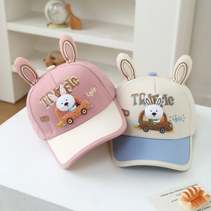 Detail of baby baseball caps with 3D bunny ears and traffic themed embroidery