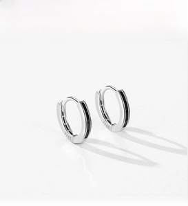 Detail of S925 sterling silver hoop earrings featuring black zircon inlay and S925 stamp