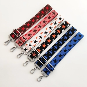 Adjustable wide shoulder straps for cross-body bags with colorful star patterns