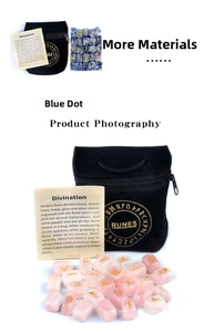 Macro detail of natural rose quartz rune stones with gold engraving and velvet bag