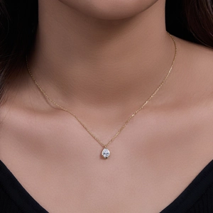 Elegant gold S925 silver necklace with a sparkling pear-shaped teardrop pendant