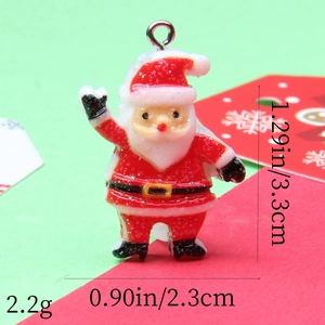 Macro view of Santa resin pendant with glitter finish and precise size measurements