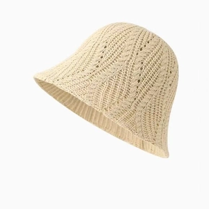 Minimalist cream knit bucket hat with hollow wavy crochet texture for women