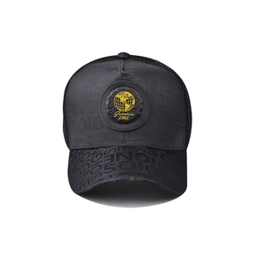 Detail showing the black mesh baseball cap with a golden globe patch and embossed texture