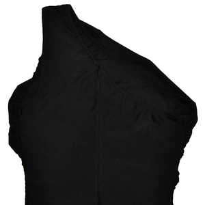 Close-up detail of sexy one-shoulder neckline and ruched black fabric texture on bodycon dress