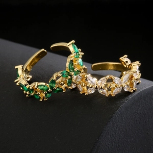 Adjustable 18K gold plated copper ring with marquise cut emerald and white cubic zirconia