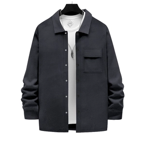 Detail of grey twill cotton jacket fabric texture and square chest flap pocket for men