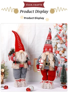 Detail of Christmas gnomes with knit hats, plush material and festive holiday decorations