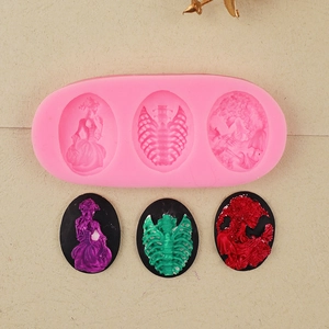 Pink silicone mold featuring 3 gothic skull and lady cameos for DIY baking and clay