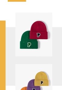Detail view of colorful knit beanies featuring the P letter patch and ribbed texture