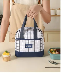 Detail of insulated lunch bag with blue and white gingham pattern and sturdy handles