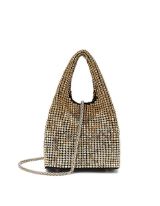 Macro detail of gradient crystal rhinestones and metallic chain on bucket evening bag