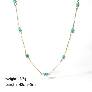 Detail view of dainty gold stainless steel necklace with blue natural stone beads