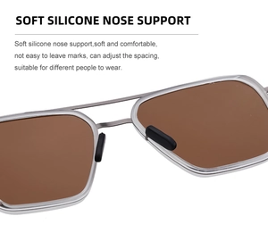 Detail of adjustable soft silicone nose pads on silver metal polarized sunglasses