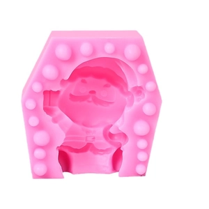 Pink silicone mold featuring a sitting Santa Claus design for soap or cake baking