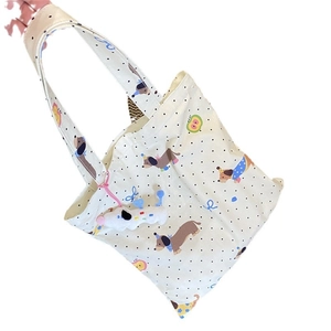 Beige dachshund print canvas tote bag with polka dots and plush puppy keychain