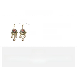 Detail view of colorful Bohemian crystal tassel earrings with dimensions 6.4x2.6cm