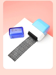 Detail of blue privacy roller stamp showing messy code ink pattern for data protection
