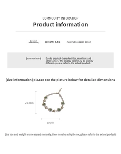 Vue macro du bracelet fleur avec zircon vert indiquant un poids de 8,5g et taille 21,2cm