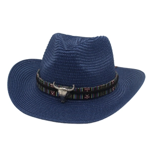 Dark blue straw cowboy hat with ethnic woven band and silver bull skull metal ornament